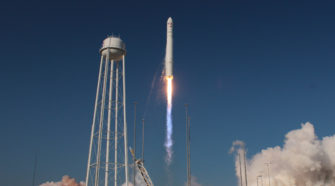 antares rocket soars into sky during launch from wallops island, virginia